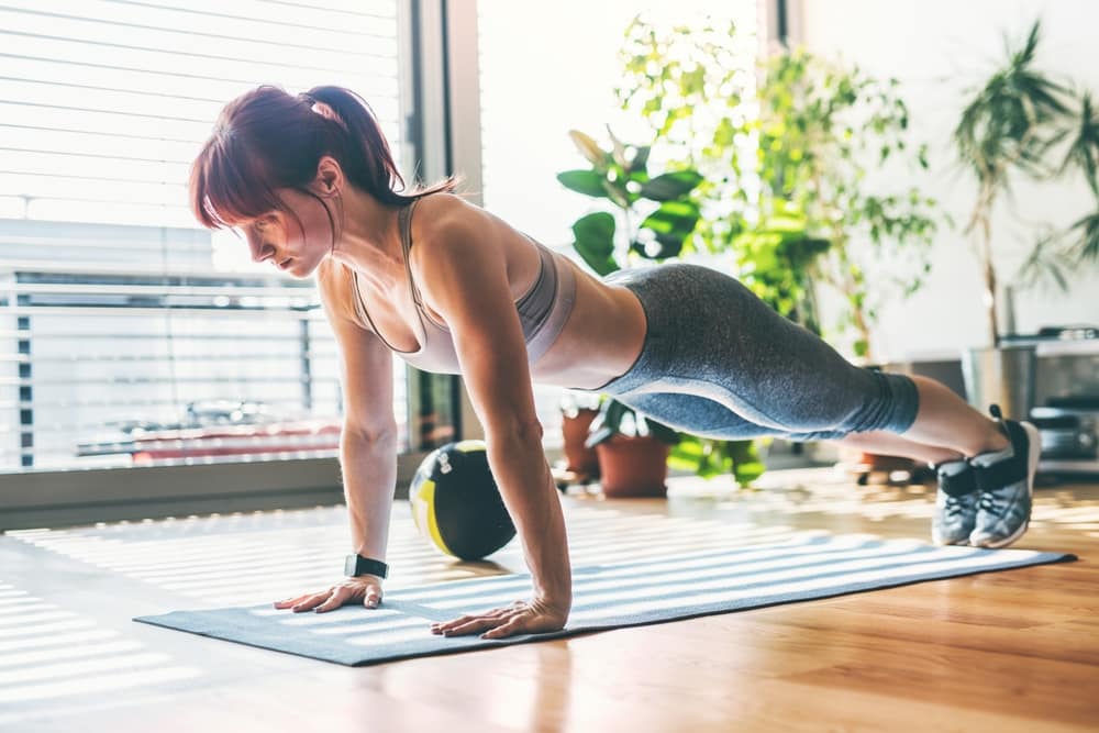 BeautifulRedheadWomansHomeFitnessRoutineHomeWorkoutOnGym - SomethingBeautiful!!