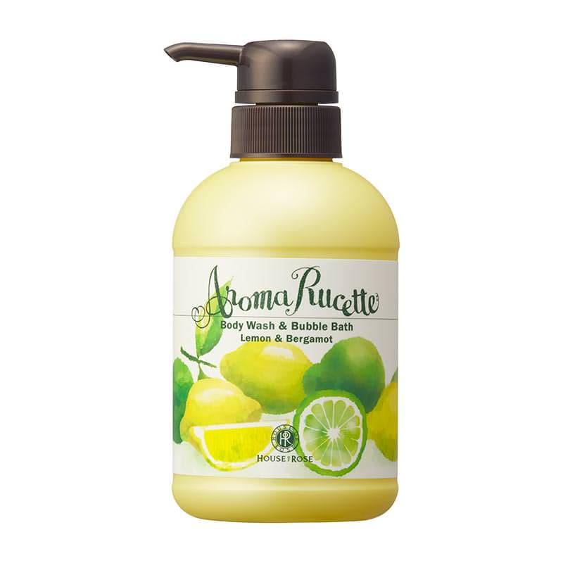 41753-1 - SomethingBeautiful!! Yellow pump bottle of lemon and bergamot body wash with citrus fruit artwork on the label, displaying lemons and lime-green leaves.